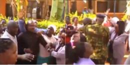 Collage of Kangai Primary School headteacher being evicted.